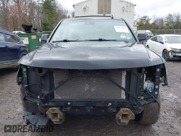 2018 Chevrolet Tahoe LT z VIN 1GNSKBKC7JR276427, wystawiony jako IAAI lot #41977418 z przebiegiem 152 007 mil mil oraz . Historia ofert i sprzedaży dostępna na DreamBid. Obrazek 6.