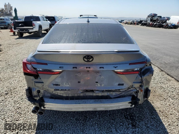 2025 Toyota Camry LE with VIN 4T1DAACK2SU517728, listed as a Copart auction lot 52567455 with 28,385 mi miles and Salvage Title. Bid and sale history available at DreamBid. Image 6.