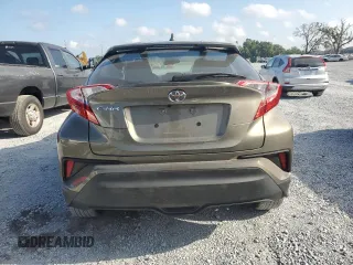 2021 Toyota C-HR LE z VIN NMTKHMBXXMR130792, wystawiony jako Copart lot #54854625 z przebiegiem 27 478 mil mil oraz Nie do naprawy • Non repairable. Historia ofert i sprzedaży dostępna na DreamBid. Obrazek 6.