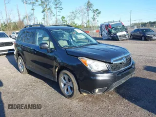 2014 Subaru Forester 2.5i Touring with VIN JF2SJAMC1EH452856, listed as a IAAI auction lot 41801406 with 148,342 mi miles. Bid and sale history available at carsss.com. Image 1.