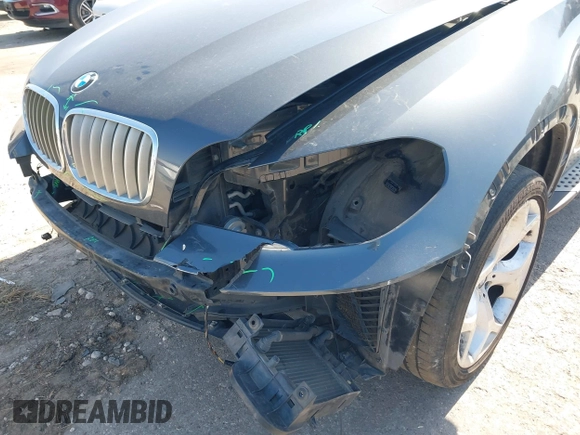 2012 BMW X5 35d with VIN 5UXZW0C51CL669957, listed as a IAAI auction lot 42230292 with 102,305 mi miles and . Bid and sale history available at DreamBid. Image 6.