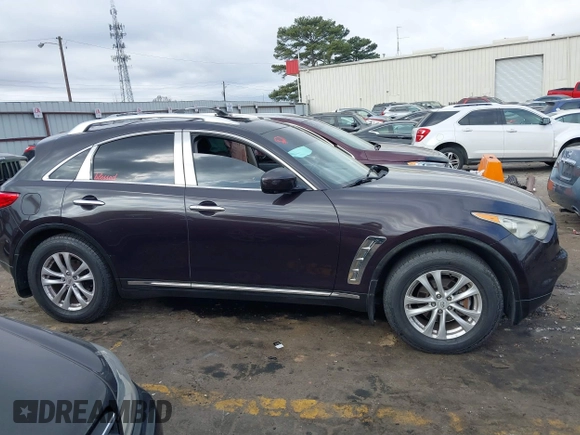 2011 Infiniti FX z VIN JN8AS1MW5BM730229, wystawiony jako IAAI lot #41716870 z przebiegiem 173 436 mil mil oraz . Historia ofert i sprzedaży dostępna na DreamBid. Obrazek 13.