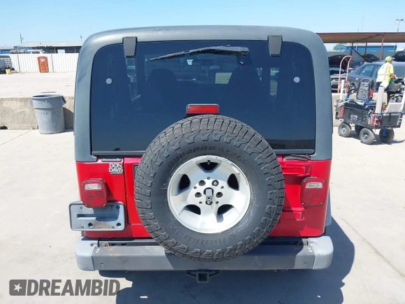 2001 Jeep Wrangler Sport with VIN 1J4FA49S11P375854, listed as a IAAI auction lot 42334037 with 215,027 mi miles and . Bid and sale history available at DreamBid. Image 16.