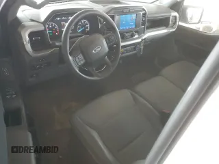 2022 Ford F-150 XL with VIN 1FTMF1CB4NKD23966, listed as a Copart auction lot 55717665 with 80,386 mi miles and Salvage title. Bid and sale history available at DreamBid. Image 8.