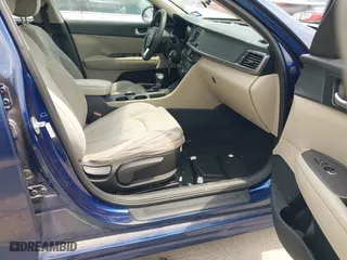 2016 Kia Optima LX with VIN 5XXGT4L30GG073039, listed as a IAAI auction lot 42055627 with 0 mi miles. Bid and sale history available at carsss.com. Image 5.