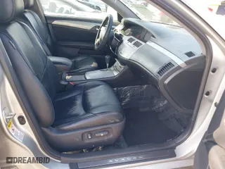 2005 Toyota Avalon XL with VIN 4T1BK36B15U035218, listed as a IAAI auction lot 41901091 with 173,503 mi miles. Bid and sale history available at carsss.com. Image 5.