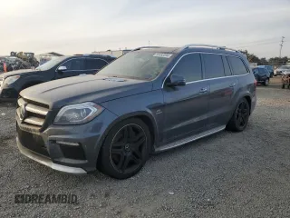 2015 Mercedes-Benz GL with VIN 4JGDF7EE5FA486574, listed as a Copart auction lot 86883394 with 74,698 mi miles and Clean Title. Bid and sale history available at carsss.com. Image 1.