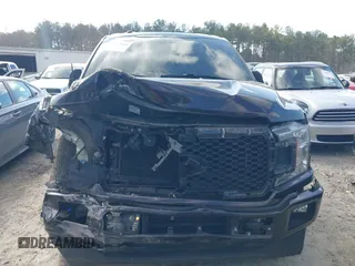 2018 Ford F-150 XL with VIN 1FTEW1CP0JFE36641, listed as a IAAI auction lot 41445055 with 137,569 mi miles and . Bid and sale history available at DreamBid. Image 12.