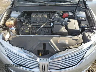 2014 Lincoln MKZ with VIN 3LN6L2JKXER806539, listed as a Copart auction lot 42724215 with 104,283 mi miles and Salvage title. Bid and sale history available at DreamBid. Image 11.