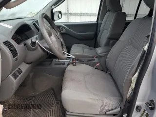 2010 Nissan Frontier SE with VIN 1N6AD0EV2AC405609, listed as a Copart auction lot 87615465 with 170,555 mi miles and Salvage title. Bid and sale history available at DreamBid. Image 7.