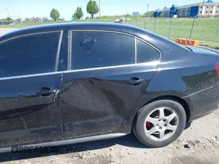 2014 Volkswagen Jetta GLI with VIN 3VW4T7AJ5EM382195, listed as a IAAI auction lot 39211126 with 94,735 mi miles and . Bid and sale history available at DreamBid. Image 6.