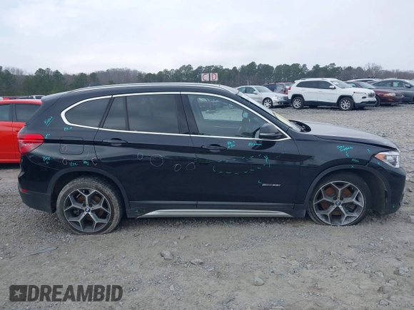 2017 BMW X1 sDrive28i with VIN WBXHU7C36HP924874, listed as a IAAI auction lot 41368396 with 113,443 mi miles. Bid and sale history available at carsss.com. Image 12.
