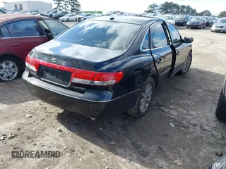 2009 Hyundai Azera Limited z VIN KMHFC46F59A428900, wystawiony jako IAAI lot #41234438 z przebiegiem 258 219 mil mil oraz . Historia ofert i sprzedaży dostępna na DreamBid. Obrazek 4.