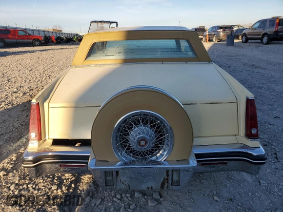 1985 Cadillac Eldorado z VIN 1G6EL5781FE647818, wystawiony jako Copart lot #77608224 z przebiegiem 7 192 mil mil oraz Czysty tytuł • Clean title. Historia ofert i sprzedaży dostępna na DreamBid. Obrazek 6.