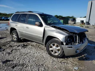 2002 GMC Envoy SLT with VIN 1GKDT13S122491329, listed as a Copart auction lot 75161714 with 149,659 mi miles and Salvage Title. Bid and sale history available at DreamBid. Image 4.