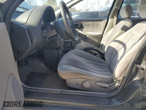 1996 Saturn SL with VIN 1G8ZK5279TZ162812, listed as a Copart auction lot 87079874 with 143,461 mi miles and Salvage title. Bid and sale history available at DreamBid. Image 7.