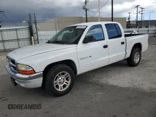 2001 Dodge Dakota Sport with VIN 1B7GL2AN21S131366, listed as a Copart auction lot 81263154 with 272,938 mi miles and Salvage Title. Bid and sale history available at DreamBid. Image 1.