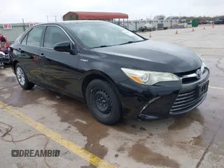 2015 Toyota Camry LE with VIN 4T1BD1FK0FU148612, listed as a IAAI auction lot 41710518 with 126,248 mi miles and . Bid and sale history available at DreamBid. Image 1.