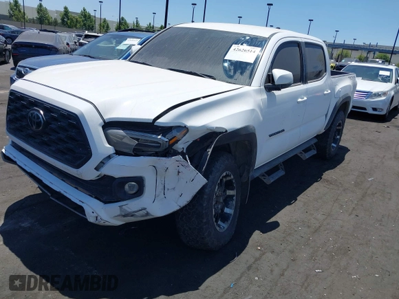 2023 Toyota Tacoma SR with VIN 3TMCZ5AN4PM558760, listed as a IAAI auction lot 42626514 with 39,335 mi miles and . Bid and sale history available at DreamBid. Image 17.