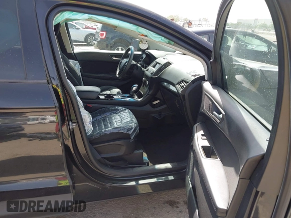 2015 Ford Edge SE z VIN 2FMTK3G83FBB52782, wystawiony jako IAAI lot #42257635 z przebiegiem 166 375 mil mil oraz . Historia ofert i sprzedaży dostępna na DreamBid. Obrazek 5.