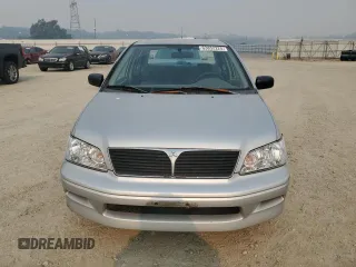 2002 Mitsubishi Lancer ES with VIN JA3AJ26E22U045919, listed as a Copart auction lot 63852225 with 184,071 mi miles and Salvage title. Bid and sale history available at DreamBid. Image 5.