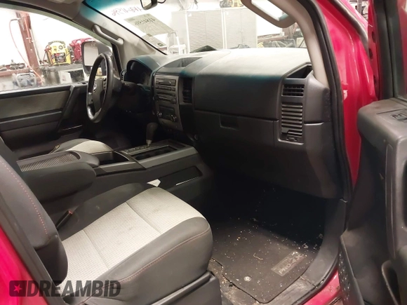 2012 Nissan Titan SV with VIN 1N6AA0EC7CN327973, listed as a IAAI auction lot 41841596 with 148,519 mi miles. Bid and sale history available at carsss.com. Image 5.