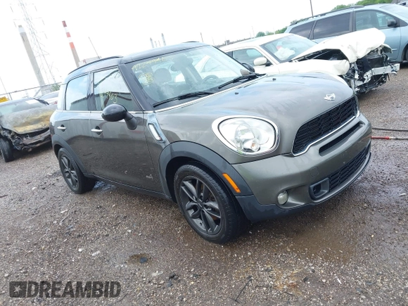 2011 MINI Countryman S with VIN WMWZC5C53BWM11022, listed as a IAAI auction lot 42249403 with 173,718 mi miles and . Bid and sale history available at DreamBid. Image 1.