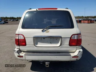 2000 Lexus LX 470 z VIN JT6HT00W1Y0096061, wystawiony jako Copart lot #52499155 z przebiegiem 199 914 mil mil oraz Tytuł czysty. Historia ofert i sprzedaży dostępna na DreamBid. Obrazek 6.