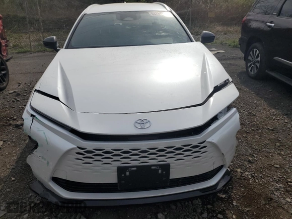 2025 Toyota Crown XLE with VIN JTDACAAJ3S3001296, listed as a Copart auction lot 54757035 with 12,003 mi miles and Salvage title. Bid and sale history available at DreamBid. Image 5.