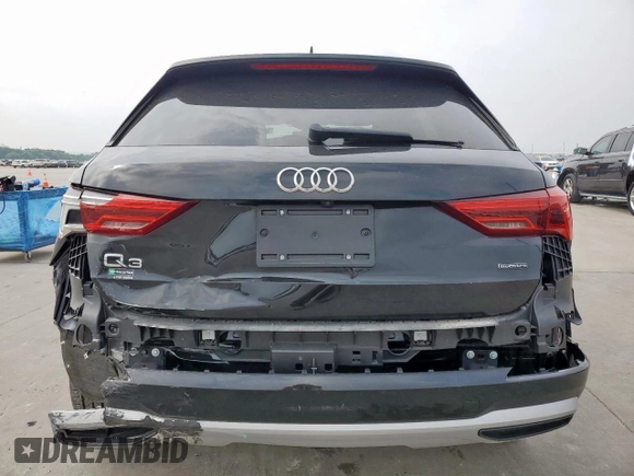2021 Audi Q3 Premium z VIN WA1AUCF33M1058867, wystawiony jako Copart lot #56708705 z przebiegiem 55 658 mil mil oraz Szkoda całkowita • Salvage title. Historia ofert i sprzedaży dostępna na DreamBid. Obrazek 6.
