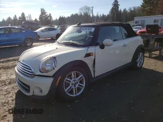 2012 MINI Convertible with VIN WMWZN3C52CT133828, listed as a Copart auction lot 89387935 with 106,567 mi miles and Salvage Title. Bid and sale history available at DreamBid. Image 1.