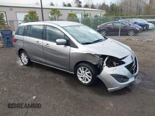 2012 Mazda 5 Sport with VIN JM1CW2BLXC0107933, listed as a IAAI auction lot 41813231 with 164,395 mi miles and . Bid and sale history available at DreamBid. Image 1.