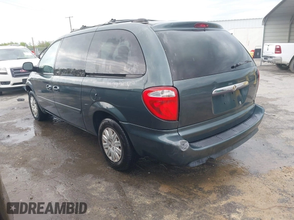 2006 Chrysler Town & Country LX with VIN 2A4GP44R96R615942, listed as a IAAI auction lot 42039452 with 158,009 mi miles and . Bid and sale history available at DreamBid. Image 3.