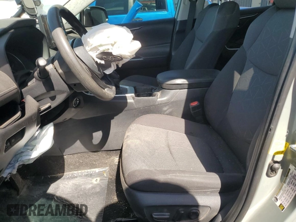 2021 Toyota RAV4 XLE with VIN 2T3W1RFV4MW134798, listed as a Copart auction lot 58802435 with 74,495 mi miles and Salvage title. Bid and sale history available at DreamBid. Image 7.