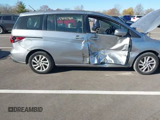 2012 Mazda 5 Sport z VIN JM1CW2BL0C0102448, wystawiony jako IAAI lot #38035360 z przebiegiem 119 438 mil mil oraz . Historia ofert i sprzedaży dostępna na DreamBid. Obrazek 6.