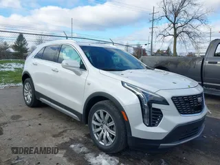 2022 Cadillac XT4 AWD Premium Luxury with VIN 1GYFZDR49NF105003, listed as a IAAI auction lot 41009382 with 43,395 mi miles and . Bid and sale history available at carsss.com. Image 1.