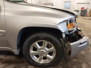 2005 GMC Envoy SLE with VIN 1GKET16S656102522, listed as a IAAI auction lot 41729310 with 233,049 mi miles. Bid and sale history available at carsss.com. Image 20.