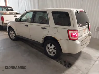 2011 Ford Escape XLS with VIN 1FMCU9C7XBKA40863, listed as a IAAI auction lot 42777301 with 219,848 mi miles and . Bid and sale history available at DreamBid. Image 3.