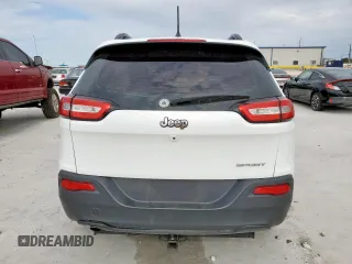 2015 Jeep Cherokee Sport with VIN 1C4PJLAB9FW632112, listed as a Copart auction lot 63265295 with 83,301 mi miles and Salvage title. Bid and sale history available at DreamBid. Image 6.