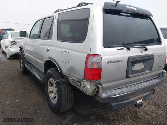 1999 Toyota 4Runner SR5 with VIN JT3HN86RXX0232435, listed as a IAAI auction lot 41473618 with 267,054 mi miles. Bid and sale history available at carsss.com. Image 3.