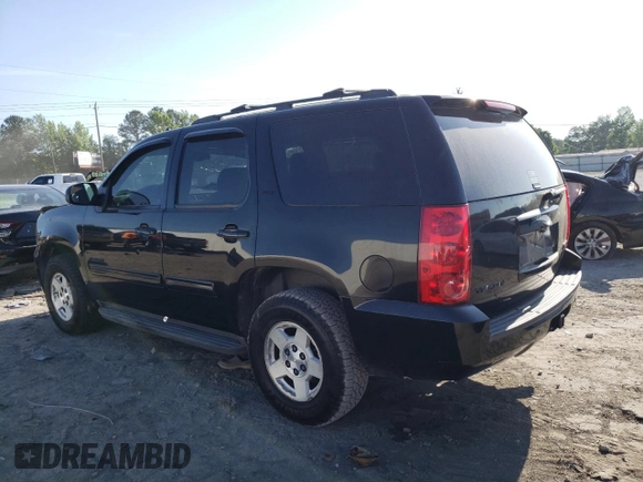2009 GMC Yukon SLT w/4SA with VIN 1GKFC33J99R297063, listed as a Copart auction lot 53212104 with 289,213 mi miles and Salvage Title. Bid and sale history available at carsss.com. Image 2.