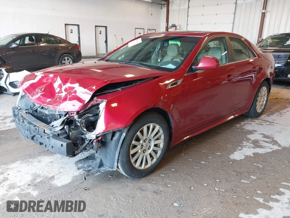 2012 Cadillac CTS Luxury with VIN 1G6DG5E5XC0122855, listed as a IAAI auction lot 41942360 with 246,820 mi miles and . Bid and sale history available at DreamBid. Image 2.