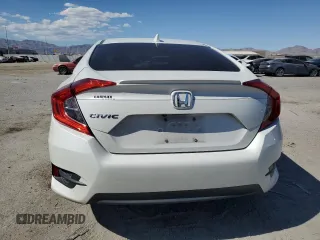 2016 Honda Civic EX-T z VIN 19XFC1F35GE029827, wystawiony jako Copart lot #55698325 z przebiegiem 108 297 mil mil oraz Szkoda całkowita • Salvage title. Historia ofert i sprzedaży dostępna na DreamBid. Obrazek 6.