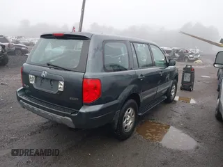 2003 Honda Pilot LX with VIN 2HKYF181X3H610581, listed as a IAAI auction lot 41743077 with 212,207 mi miles and . Bid and sale history available at DreamBid. Image 4.