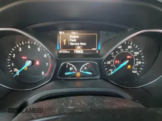 2018 Ford Focus SE z VIN 1FADP3FE0JL293485, wystawiony jako Copart lot #61202625 z przebiegiem 91 025 mil mil oraz Szkoda całkowita • Salvage title. Historia ofert i sprzedaży dostępna na DreamBid. Obrazek 9.