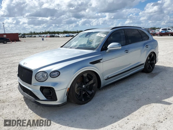 2022 Bentley Bentayga V8 z VIN SJAAM2ZV9NC011752, wystawiony jako Copart lot #79142714 z przebiegiem Nie podano mil oraz Nie do naprawy. Historia ofert i sprzedaży dostępna na DreamBid. Obrazek 1.