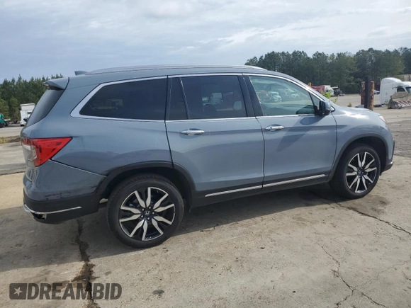 2022 Honda Pilot Touring 7-Passenger z VIN 5FNYF5H69NB031540, wystawiony jako Copart lot #51661185 z przebiegiem 58 316 mil mil oraz Szkoda całkowita • Salvage title. Historia ofert i sprzedaży dostępna na DreamBid. Obrazek 3.