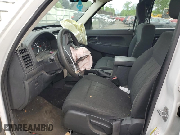 2011 Jeep Liberty Sport with VIN 1J4PN2GK0BW588379, listed as a Copart auction lot 57765655 with 137,248 mi miles and Salvage title. Bid and sale history available at DreamBid. Image 7.