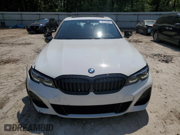 2022 BMW 3 Series 330i with VIN 3MW5R1J06N8C31334, listed as a Copart auction lot 52724395 with 36,445 mi miles and Salvage Title. Bid and sale history available at carsss.com. Image 5.
