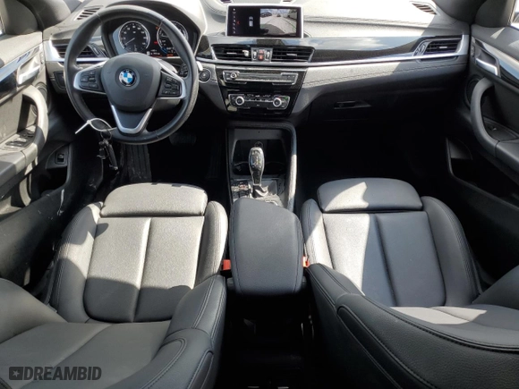 2021 BMW X2 sDrive28i with VIN WBXYH9C04M5S06770, listed as a Copart auction lot 69489874 with 27,076 mi miles and Salvage Title. Bid and sale history available at carsss.com. Image 8.